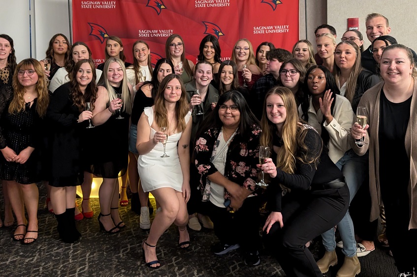 large group of graduates posing for a photo at Senior Toast